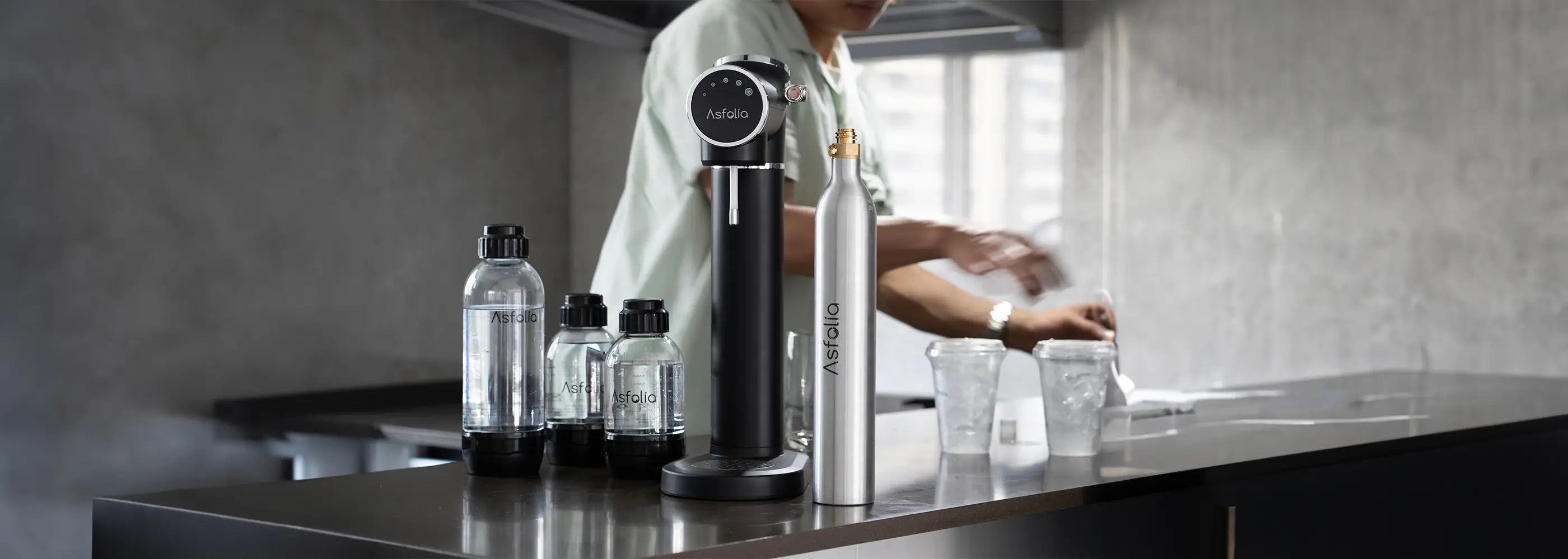LED water carbonator and sparkling water bottle on the table